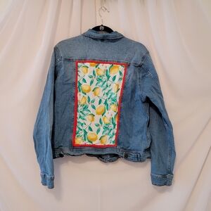 Serra Brand jean jacket hand embroidered with red and a lemon patch size large